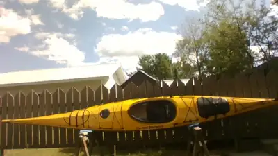 Great touring kayak for Georgian Bay. Kayak has deck mounted compass. Includes spray skirt, travel c...