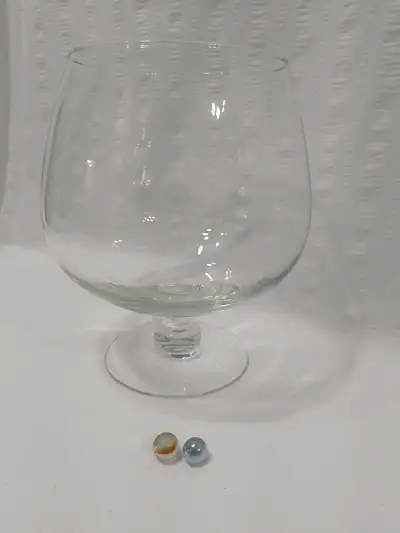 Excellent condition. 10 inches high by 8 inch diameter. (Marbles shown for perspective of size.) Als...