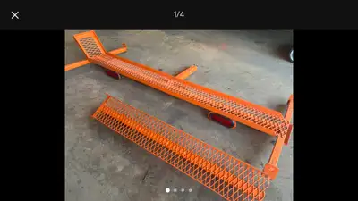 Heavy duty custom made motorcycle carrier. Comes with integrated tail lights and ramp and is extreme...