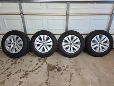 For sale is a set of used 17" Subaru wheels that are in near perfect condition. Mounted on the wheel...