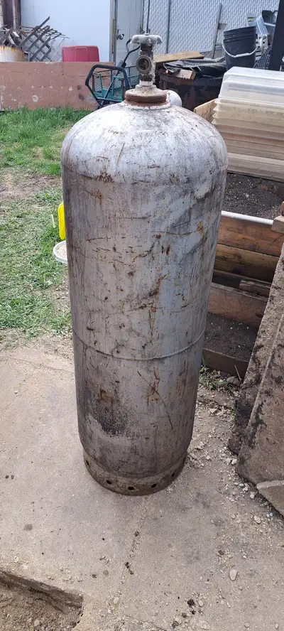 Give away 100 pound propane tank. I do not know how much propane is in it. Date has expired. Do not...