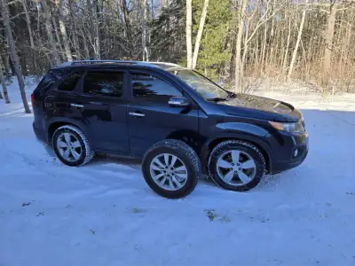 Runs good. Nearly new winter studded tires on Alloy rims. Comes with 4 summer tires on Alloy rims