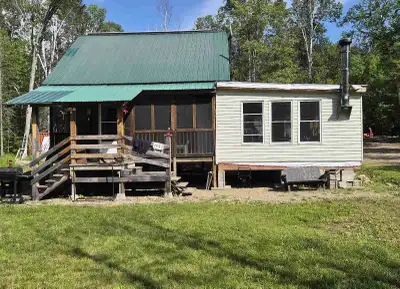 Escape to nature in this charming, rustic cottage that offers a tranquil retreat from the bustle of...