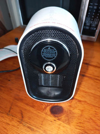 Mini space heater with humidifier.