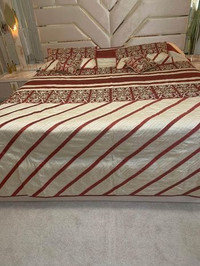 Bed sheet and 2 red drapes