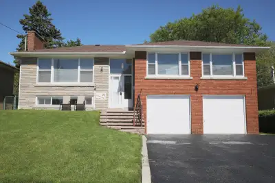 Beautiful, spacious raised bungalow with large windows all throughout in a scenic and peaceful area....