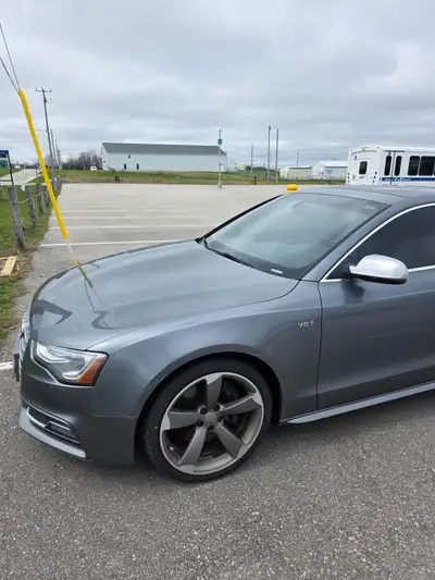 Selling my 2014 Audi S5, a stylish coupe known for its performance and sleek design. While it's a us...