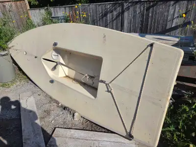 laser sailboat with all parts except a sail.