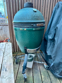 Large Big Green Egg on Nest with pizza stone