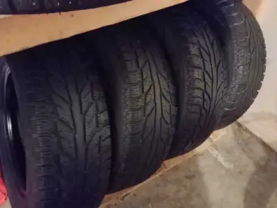 Set of 215/70/16 Cooper Weather Master winter tires in good used condition, approximately 60% plus t...