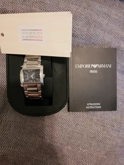 Gently used Emporio Armani women's watch Needs battery Classic watch over 10 years old