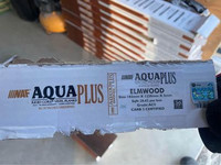 Aqua Plus bronze collection luxury vinyl plank flooring.