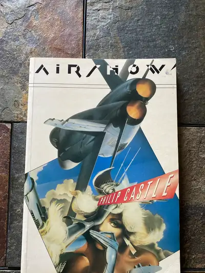 This Vintage 1989 first edition of airbrush art from Philip Castle is a softcover from Dragon's Worl...
