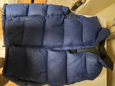 Mens down vest from Eddie Bauer, it is a size small with 700 goose down fill. It is in very good con...