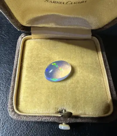 Unset 1.4 gram oval Mexican Water Opal, View more