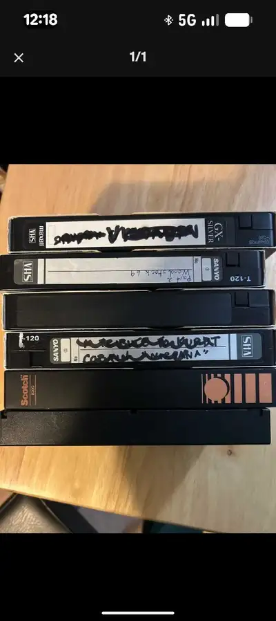 Offering a collection of used VHS tapes, perfect for collectors or those looking to relive the analo...