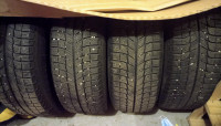 Set of 215/65R16 Winter Tires on Chevy Rims