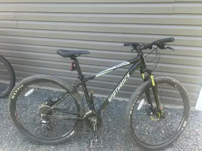Two mountain bikes, View more