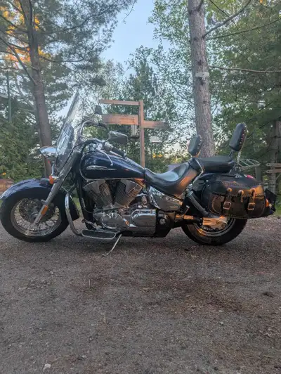 Great ride. Brand new rubber front and back. Comes with leather saddle bags and the leather rear pac...