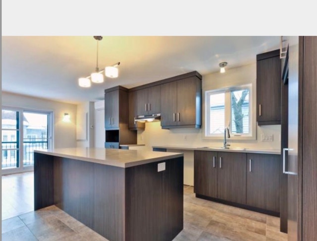 4 1/2 style condo — photo 1