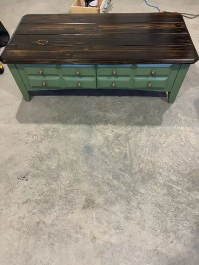 Add a touch of vintage charm to your home with this beautiful antique solid pine coffee table. Featu...