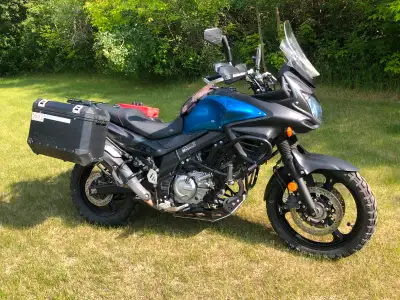 2013 DL650 vtwin liquid cooled. Motech bags, skid plate, folding hiway pegs, heated grips, additiona...