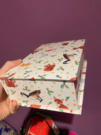Vintage box with a lid, features a design of foxes, geese, squirrels, rabbits and cardinals. The box...