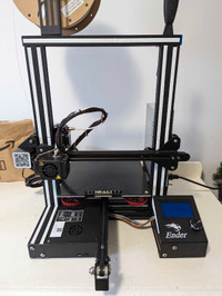 Upgraded Ender 3 with accessories.
