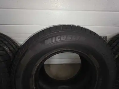 Michelin defender LTX M/S size 235/75R15. Tires have about 90 percent tread life left on them. Also...