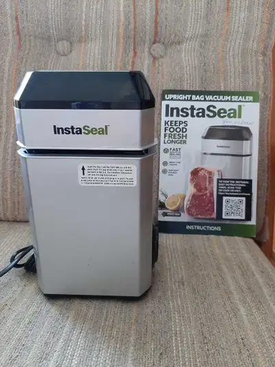 Like new instaseal with 5 rolls of extra freezer bags. Instruction manual $ 140.00 new