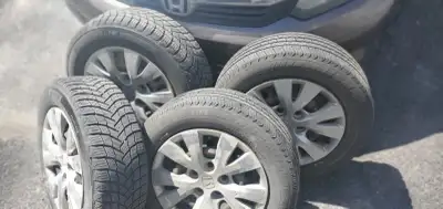 4 Set of Michelin Tires with Rims 195/65 R 15 2 Set All season + 2 Set Winter Good for 1 or 2 season...