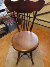 Antique high-back solid wood swivel piano stool c/w claw feet