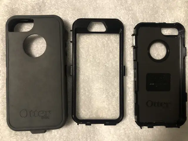 iPhone 5s with an Otterbox and an extra case 62863734263169123