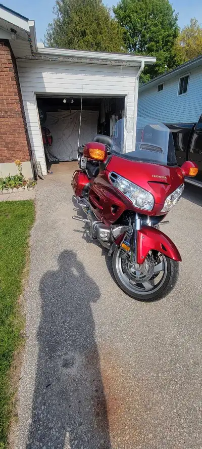 2004 Honda Goldwing 1800cc red. In excellent shape. Only 75,000km. New tire last year. Nothing to sa...