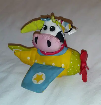 Yookidoo Tap 'n Play Musical Plane, COW, 2017 Yookidoo Cow Airplane, 2017 Has hook that attaches to...