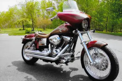 2009 Dyna Super Glide Mint Condition 130000 km Show Bike Many Extras. Reason for selling... had my f...