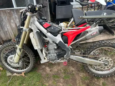 Parting out 2010 Honda crf250r Blown motor, kickstart stuck up Has tons of brand new parts, bike was...