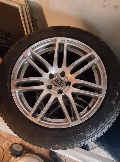 Rims with tires. Tires are like new. Any info call or email me. Peter