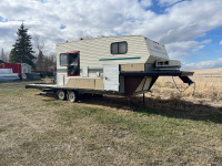 Okanogon camper on flat deck fifth wheel trailer 