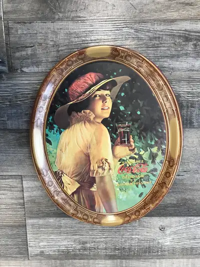 Vintage Coca Cola Metal Serving Tray measures 12.75” x 10.5” The item is vintage, shows minor wear o...