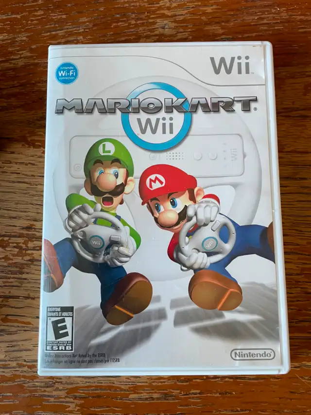 Mario Kart Wii with 2 Racing Wheels in Nintendo Wii in Lethbridge - Image 4