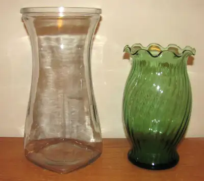 2 Glass Flower Vases In Perfect Conditon, View more