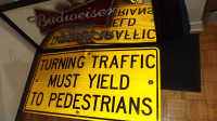 "TURNING TRAFFIC MUST YIELD"  4 FT. WIDE ROAD SIGN/TRAFFIC SIGN