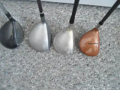 FOUR RIGHT HANDED 7 GOLF WOODS   1, View more