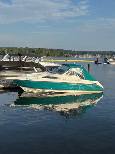 230 Regal in beautiful condition. 350 Mag /Alpha Drive. EZ Loader trailer. Boat is fully serviced an...