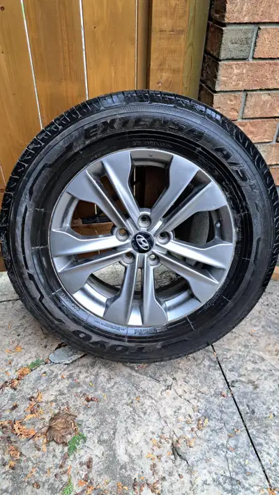 Four tires on aluminum rims - 235/65, R17 104H. They were on a 2016 Hyundai Sante Fe and only used f...