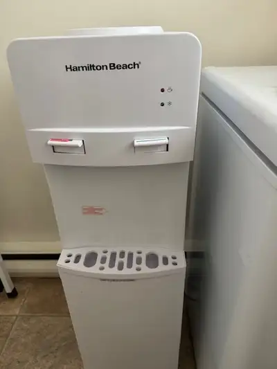 Almost brand new Hamilton Beach water cooler that dispenses both Hot & Cold Water. It's very lightly...