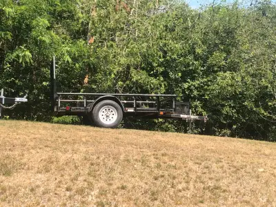 5’ X 10 ‘ with 2 x 8 pressure treated lumber on top of steel mesh Folding mesh ramp 3500 lbs axle Wh...