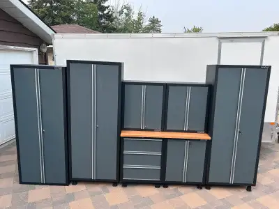 BARELY USED! These garage cabinets have been stored in the garage but most were not used. We are mov...