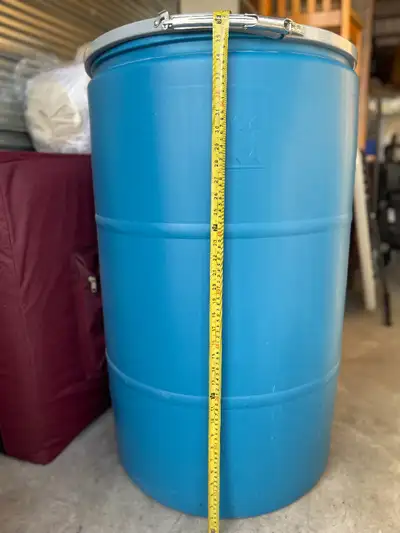 2 different sizes of Plastic Drums / Barrels with Lids - Open Top, Blue. $190 for BOTH Drums/Barrels...